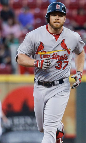 Boom! Two home runs from Moss help Cards sail past Reds 12-7